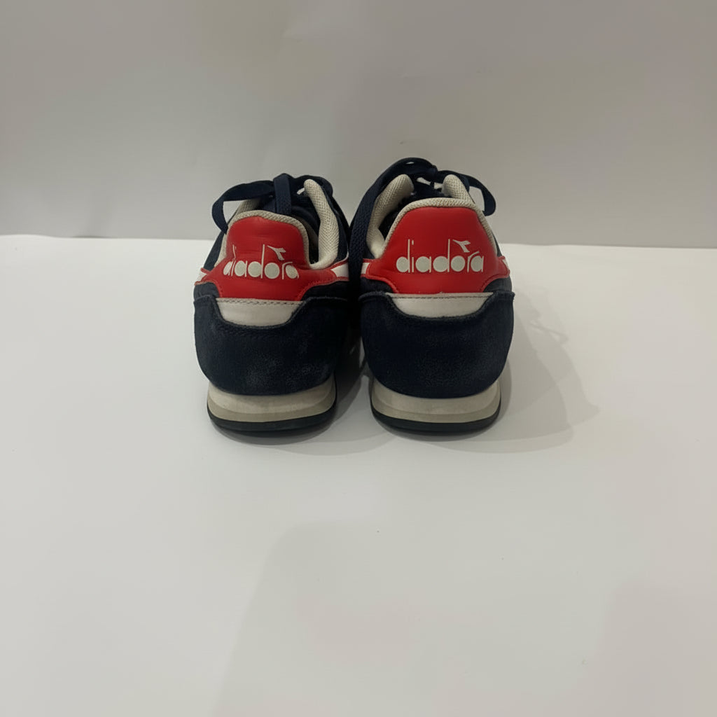 Pair of Diadora sneakers on a white background